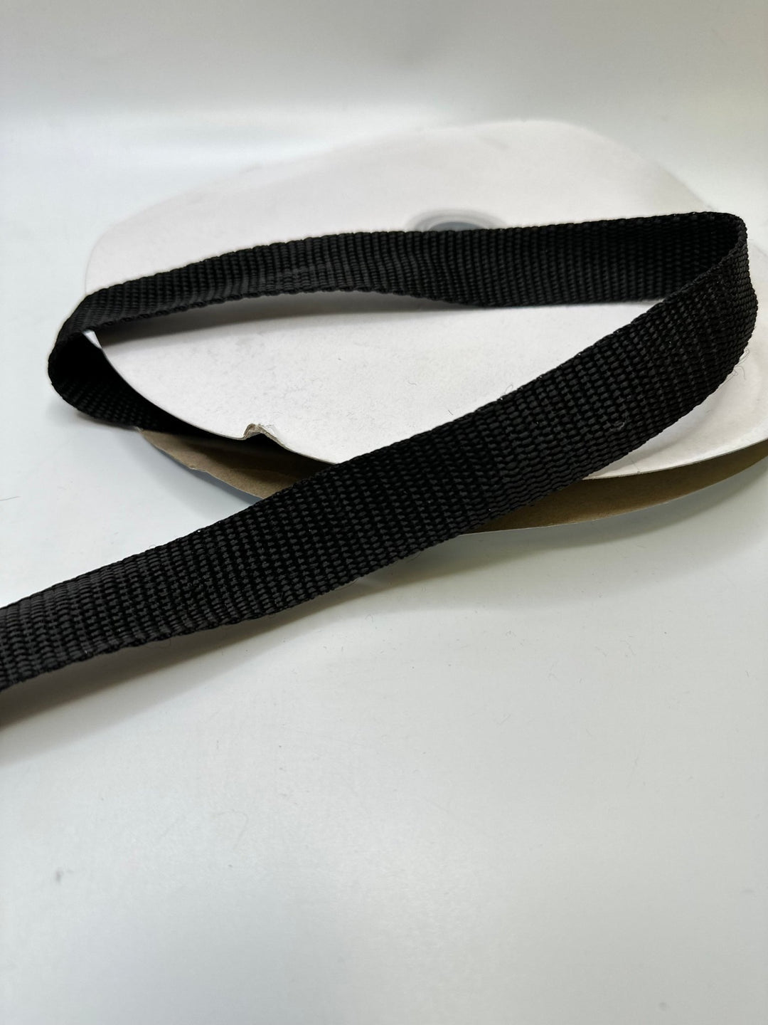 1" (25mm) Webbing Trim - Black - Roll - True Deadstock supplies Fabric by private - Sustainable Textile | FABCYCLE