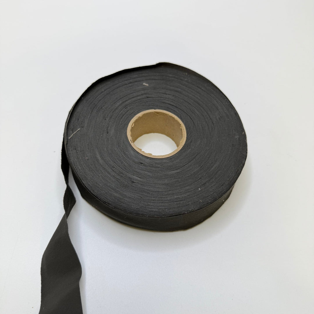 1" Continuous Woven Bias Tape - Dark Grey - Roll - True Deadstock supplies Fabric by private - Sustainable Textile | FABCYCLE