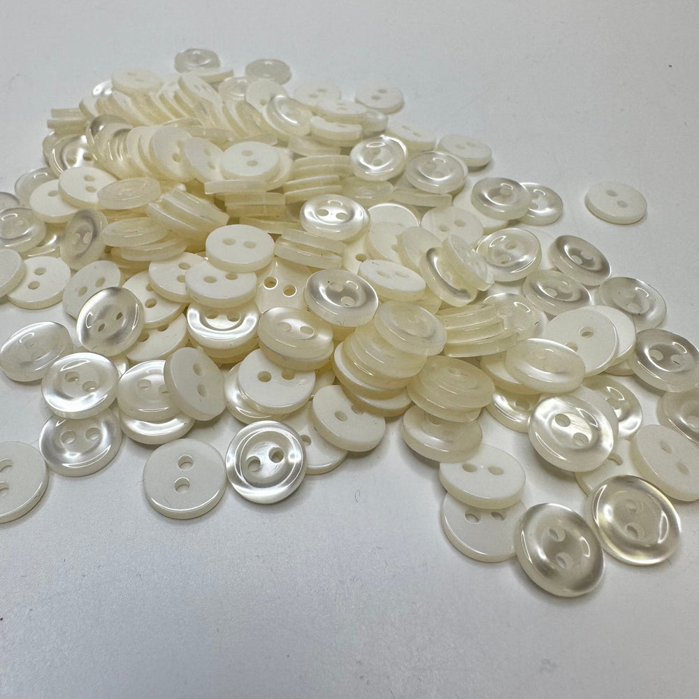 2 Hole Button - 10MM Plastic - Cream - True Deadstock supplies Fabric by private - Sustainable Textile | FABCYCLE