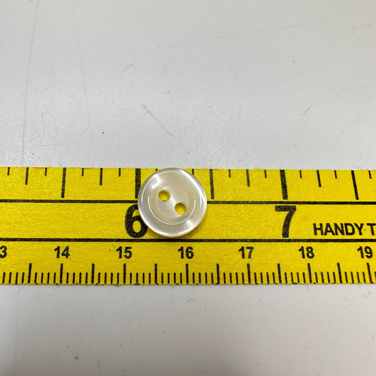 2 Hole Button - 10MM Plastic - Cream - True Deadstock supplies Fabric by private - Sustainable Textile | FABCYCLE