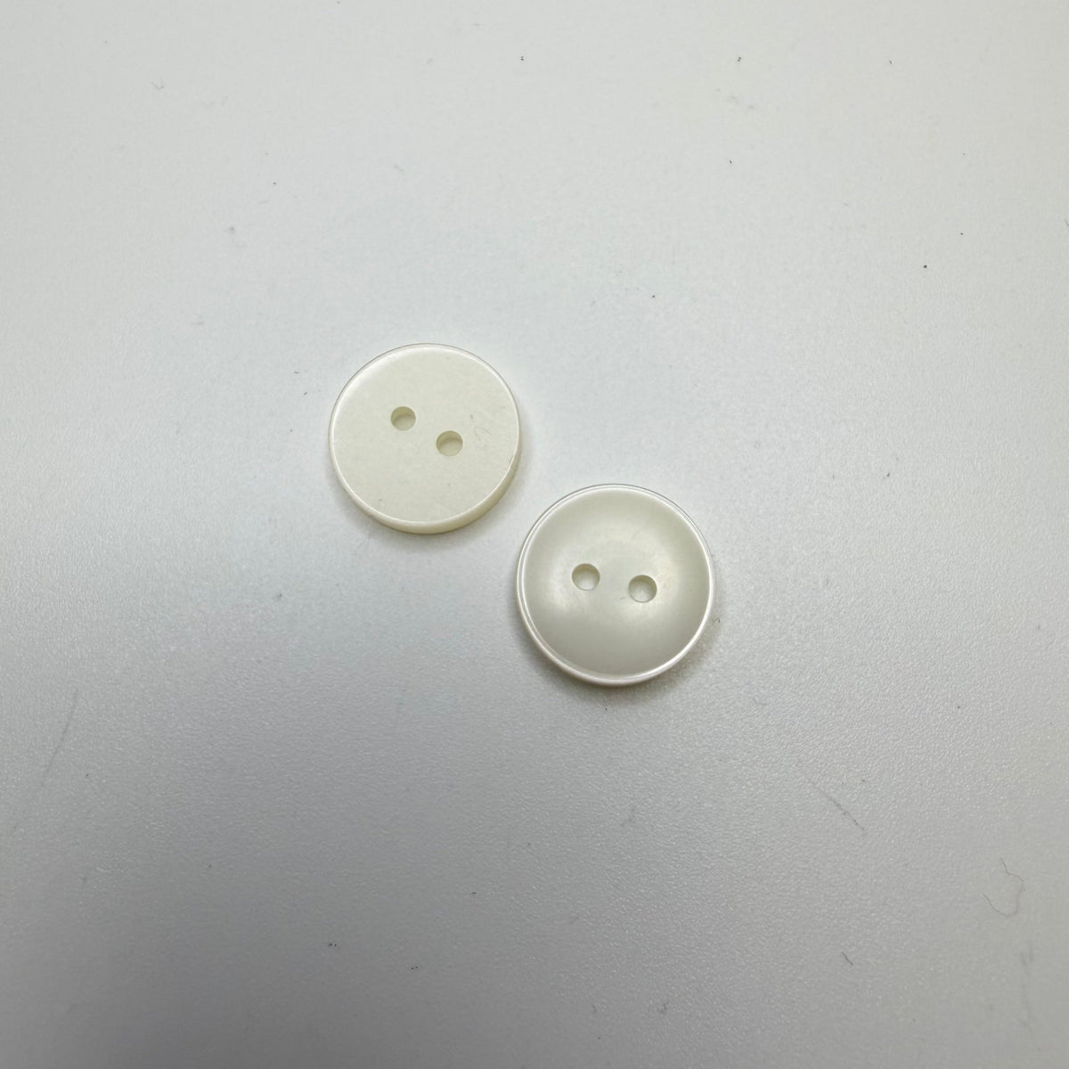 2 Hole Button - 15MM Plastic - Translucent White - 2 Pack - True Deadstock supplies Fabric by private - Sustainable Textile | FABCYCLE