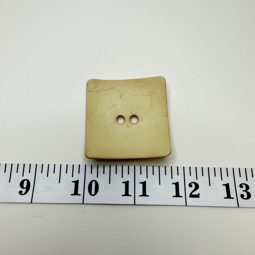 2 Hole Button - 45MM Plastic - Dark Cream - True Deadstock supplies Fabric by private - Sustainable Textile | FABCYCLE