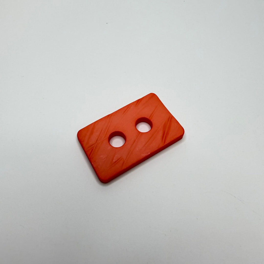 2 Hole Button - 50MM Plastic - Orange/Pink - True Deadstock supplies Fabric by private - Sustainable Textile | FABCYCLE