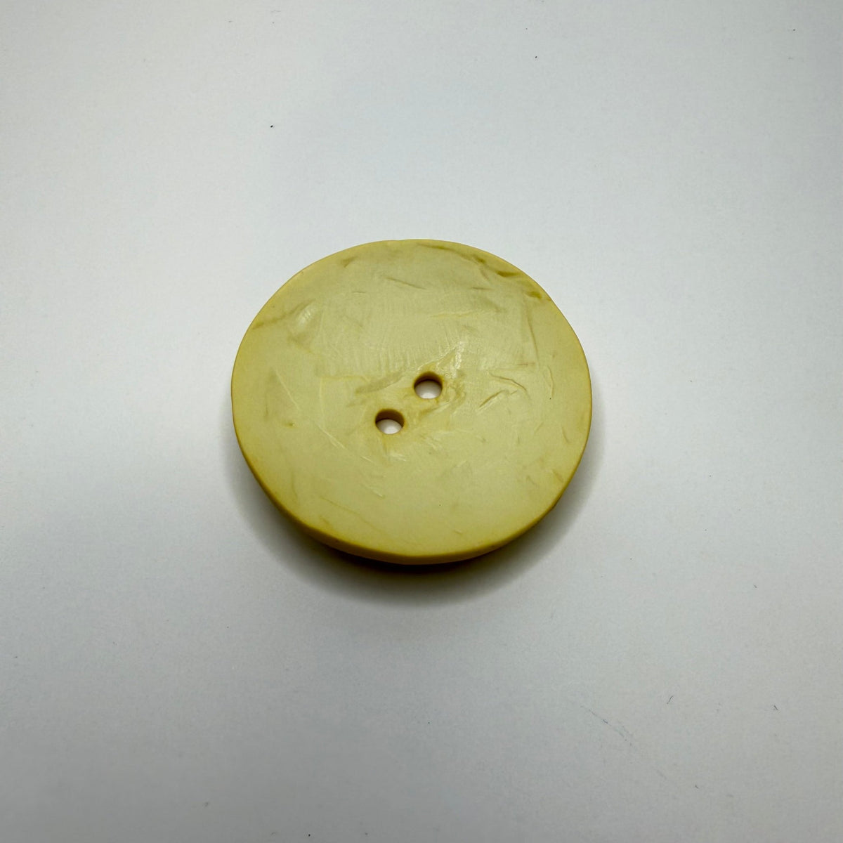 2 Hole Button - 60MM Plastic - Dark Cream - True Deadstock supplies Fabric by private - Sustainable Textile | FABCYCLE