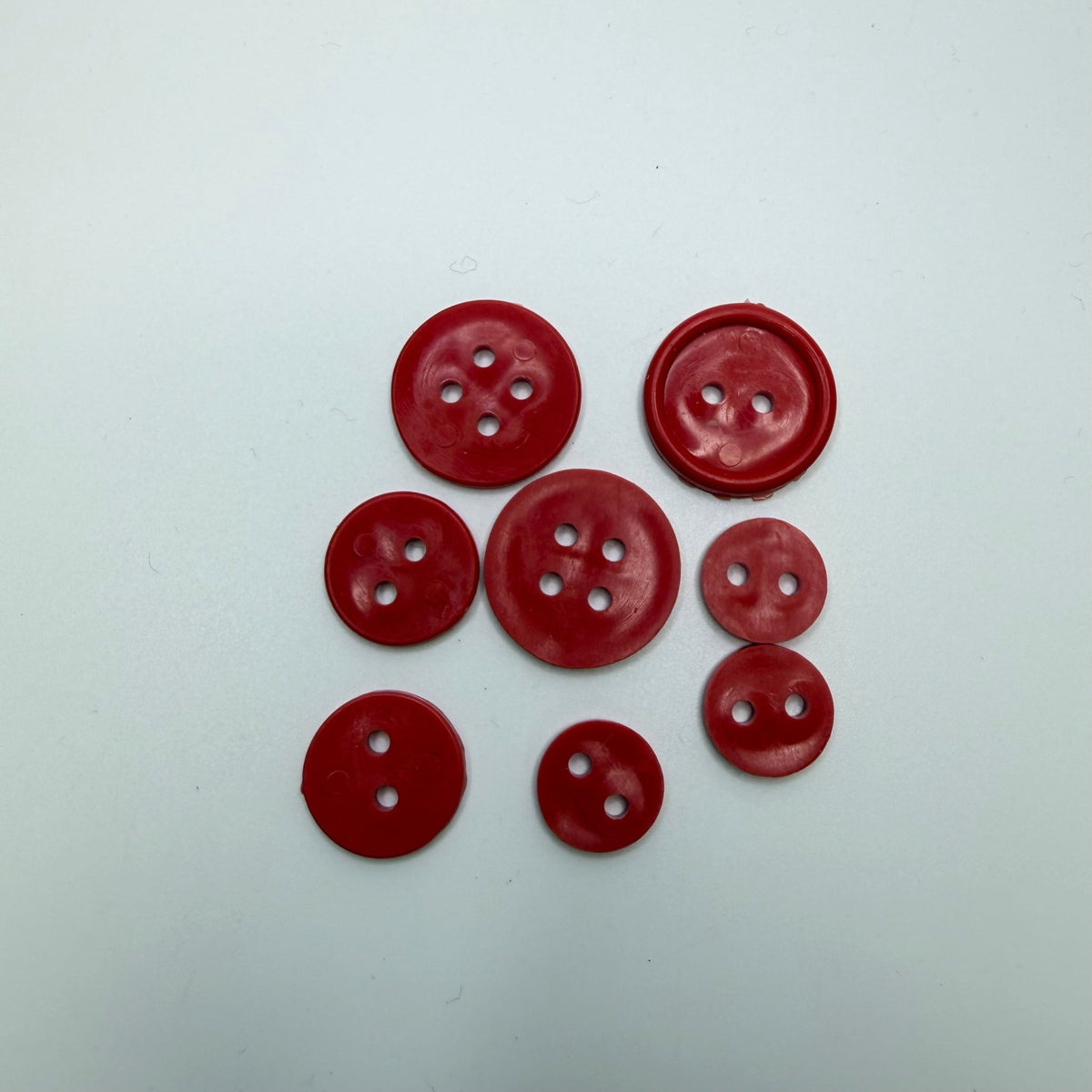 2 Hole Button - Plastic - Red - 8 Pack - True Deadstock supplies Fabric by private - Sustainable Textile | FABCYCLE