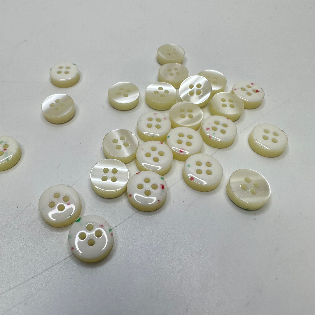 4 Hole Button - 10MM Plastic - Cream/Grn & Pink Speckles - 25 Pack - True Deadstock supplies Fabric by private - Sustainable Textile | FABCYCLE
