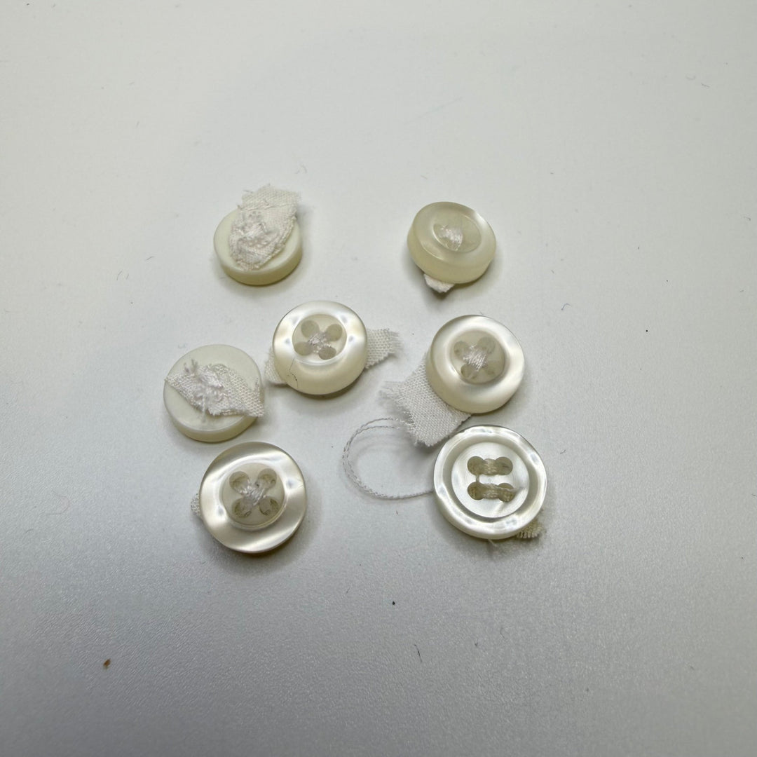 4 Hole Button - 10MM Plastic - Translucent White - 7 Pack - True Deadstock supplies Fabric by private - Sustainable Textile | FABCYCLE