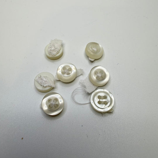 4 Hole Button - 10MM Plastic - Translucent White - 7 Pack - True Deadstock supplies Fabric by private - Sustainable Textile | FABCYCLE