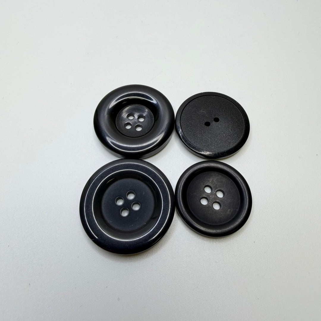 4 Hole Button - Plastic - Black - 4 Pack - True Deadstock supplies Fabric by private - Sustainable Textile | FABCYCLE