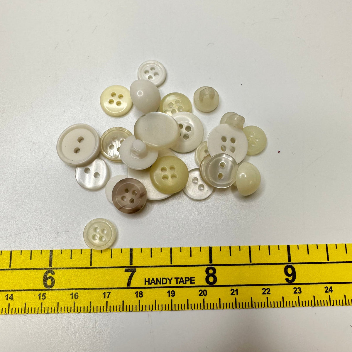 4 Hole Button - Plastic - Light Beige/Cream - 25 Pack - True Deadstock supplies Fabric by private - Sustainable Textile | FABCYCLE