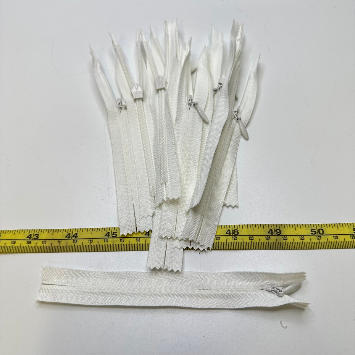 5" YKK Invisible Zipper - Closed End - White - 10 Pack - True Deadstock supplies Fabric by private - Sustainable Textile | FABCYCLE