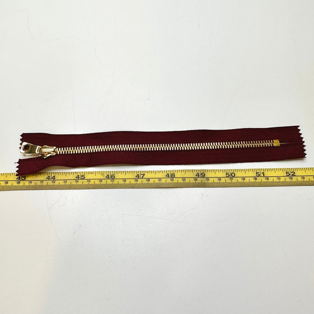 8" Metal Zipper - Closed End - Gold/Burgundy - True Deadstock supplies Fabric by private - Sustainable Textile | FABCYCLE