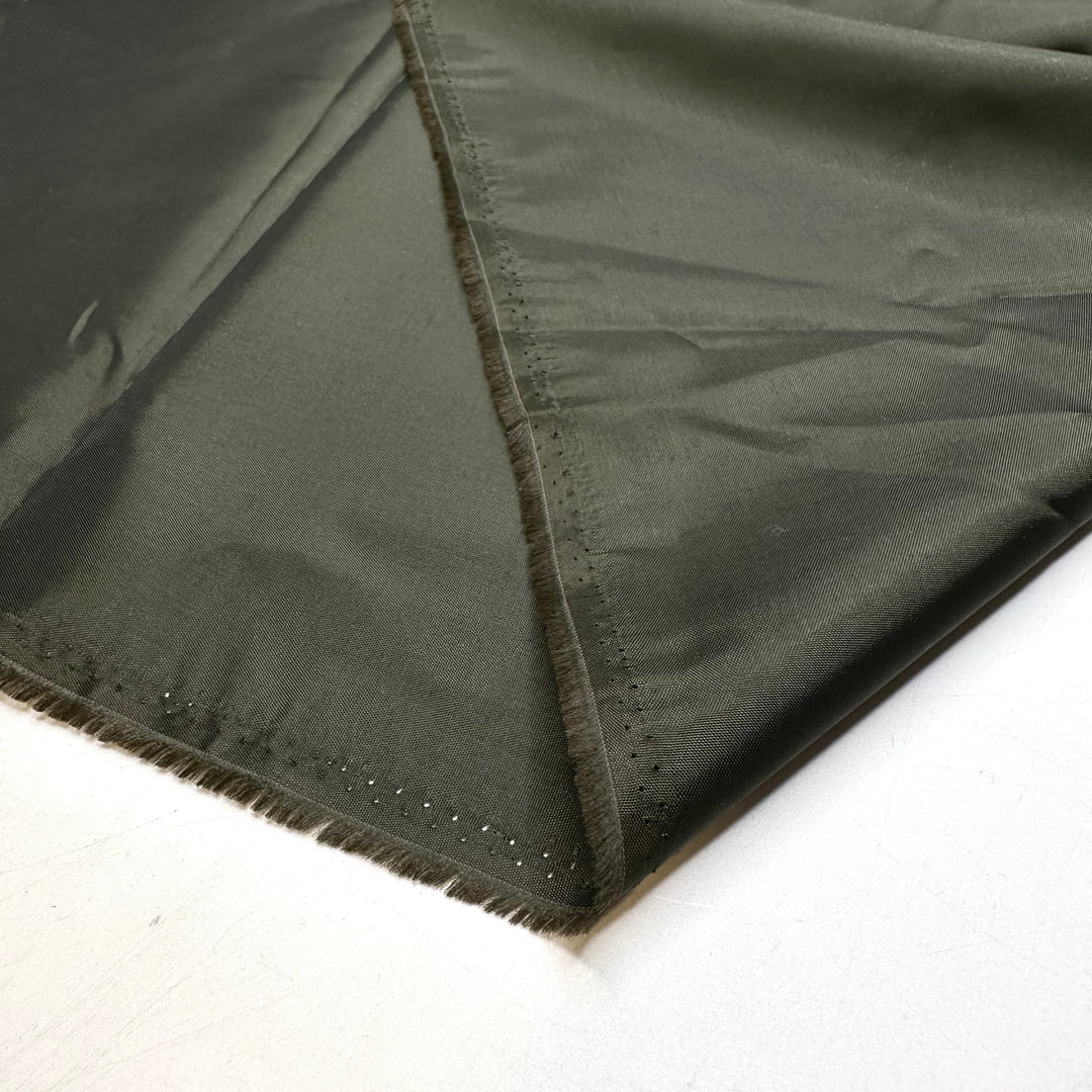 I Prefer The Original Jumanji - Satin Poly Woven - Dark Green - Bundles - FABCYCLE Deadstock and Sustainble Fabrics and Sewing Supplies