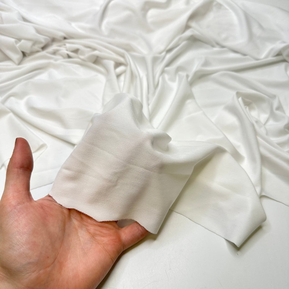 A Friendly Ghost - Jersey Polyester Blend Knit - White - Bundles - True Deadstock fabric Fabric by private - Sustainable Textile | FABCYCLE