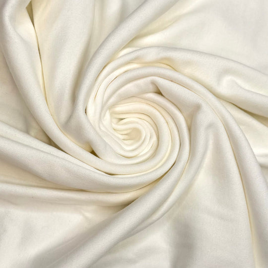 A Single Cloud In The Sky - Tubular Rib Knit Cotton Knit - Light Cream - 2.3M Bundle - True Deadstock fabric Fabric by private - Sustainable Textile | FABCYCLE