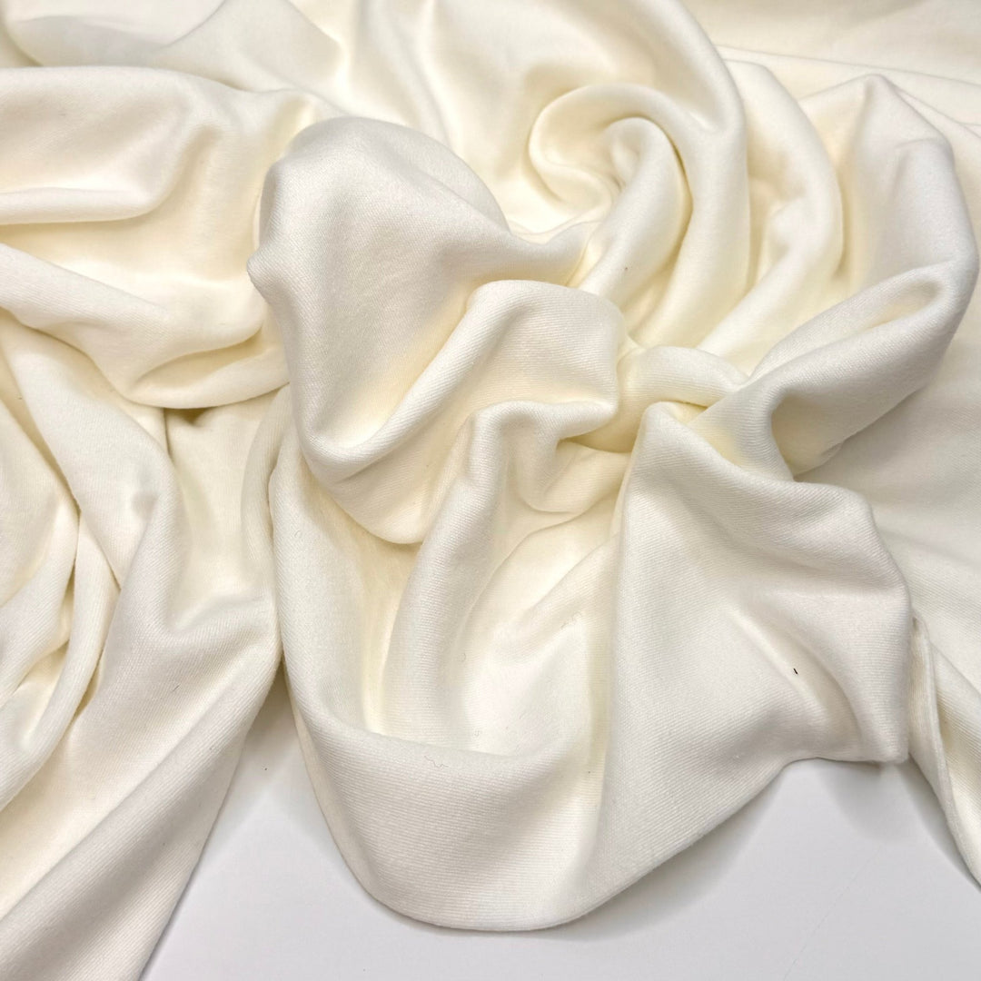 A Single Cloud In The Sky - Tubular Rib Knit Cotton Knit - Light Cream - 2.3M Bundle - True Deadstock fabric Fabric by private - Sustainable Textile | FABCYCLE