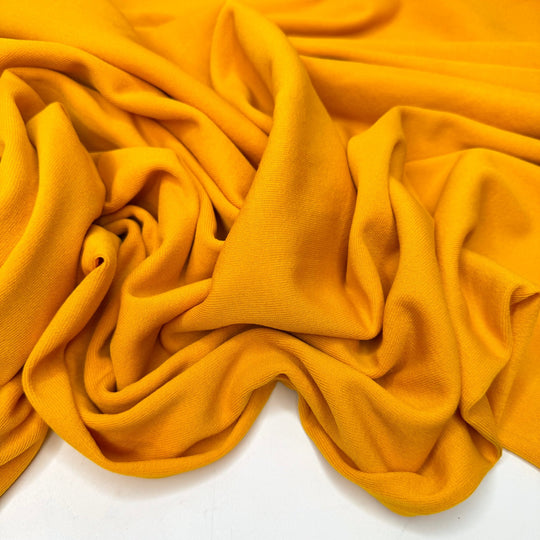 A Summer To Remember - Tubular Rib Knit Polyester Blend Knit - Dark Yellow - 2M Bundle - True Deadstock fabric Fabric by private - Sustainable Textile | FABCYCLE