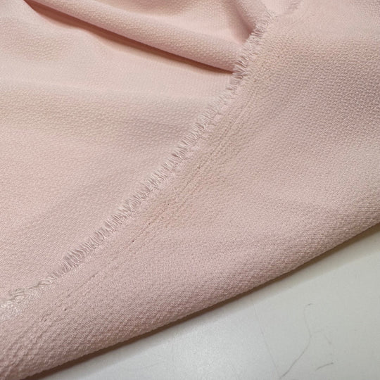 After The Ballet Recital - Waffle Press Texture Crepe Poly Woven - Light Pink - 1.4M Bundle - True Deadstock fabric Fabric by private - Sustainable Textile | FABCYCLE