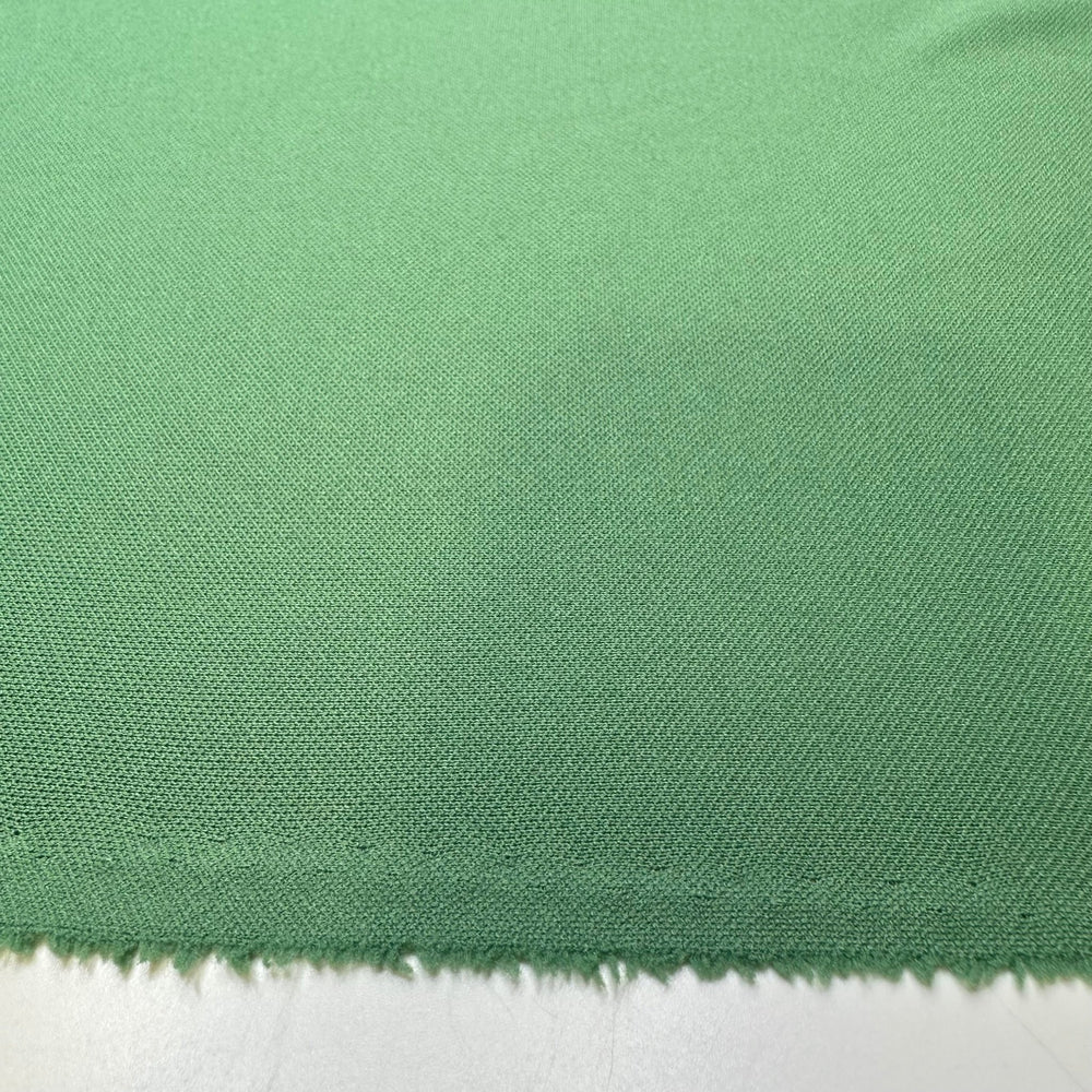 All The Green Flags - Jersey Poly/Acrylic Knit - Light Green - 2.4M Bundle - True Deadstock fabric Fabric by private - Sustainable Textile | FABCYCLE