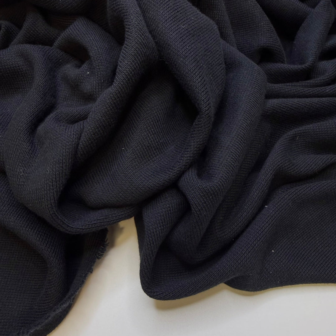 Babies Took Their First Steps - Rib Knit Cotton Blend Knit - Black - 1.9M Bundle - True Deadstock fabric Fabric by private - Sustainable Textile | FABCYCLE