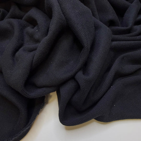 Babies Took Their First Steps - Rib Knit Cotton Blend Knit - Black - 1.9M Bundle - True Deadstock fabric Fabric by private - Sustainable Textile | FABCYCLE