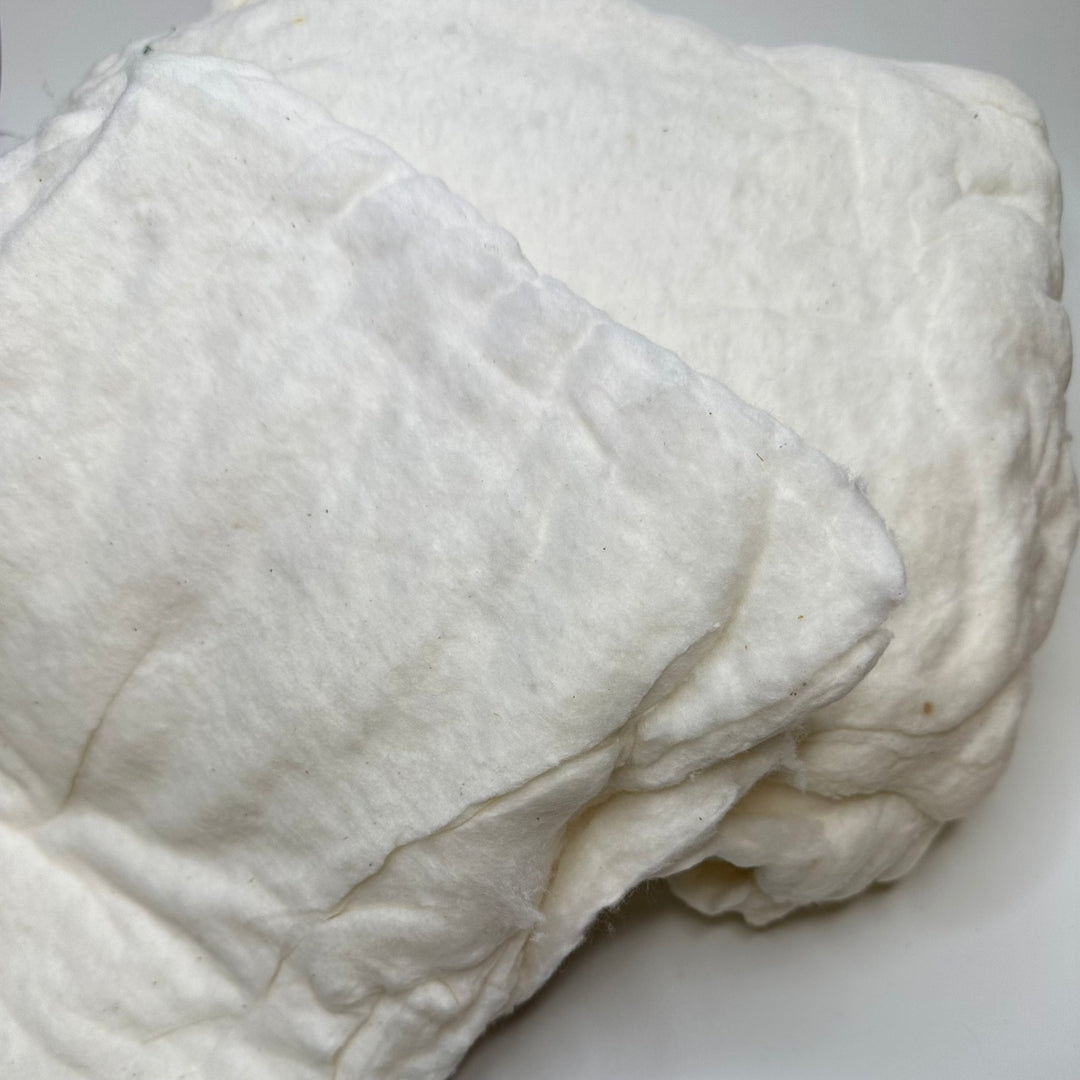 Bag Of Batting Pieces Batting - Light Cream - Individual - True Deadstock supplies Fabric by private - Sustainable Textile | FABCYCLE