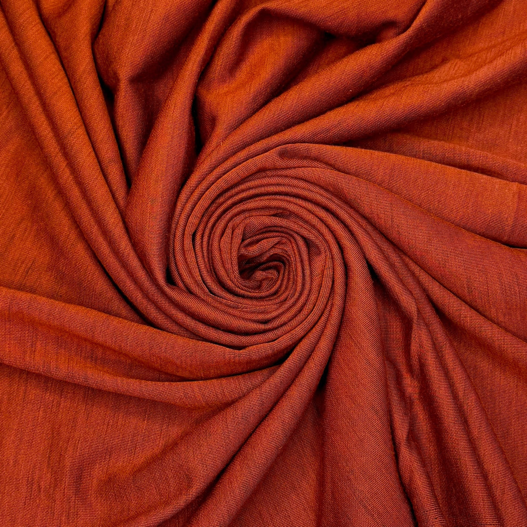 Be Still My Knitting Heart - Double Cloth Knit Polyester Blend - Dark Orange/Black - 1.2M Bundle - True Deadstock fabric Fabric by private - Sustainable Textile | FABCYCLE