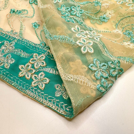 Because I Said So - Metallic Polyester Blend Woven - Light Beige/Teal Floral Border - 2.2M Bundle - True Deadstock fabric Fabric by private - Sustainable Textile | FABCYCLE