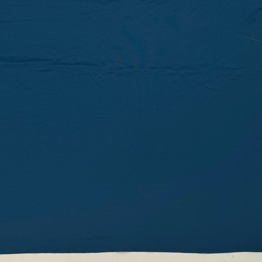 Bottom Of The Ocean - Jersey Poly/Spandex Knit - Dark Teal - 1M Bundle - True Deadstock fabric Fabric by private - Sustainable Textile | FABCYCLE