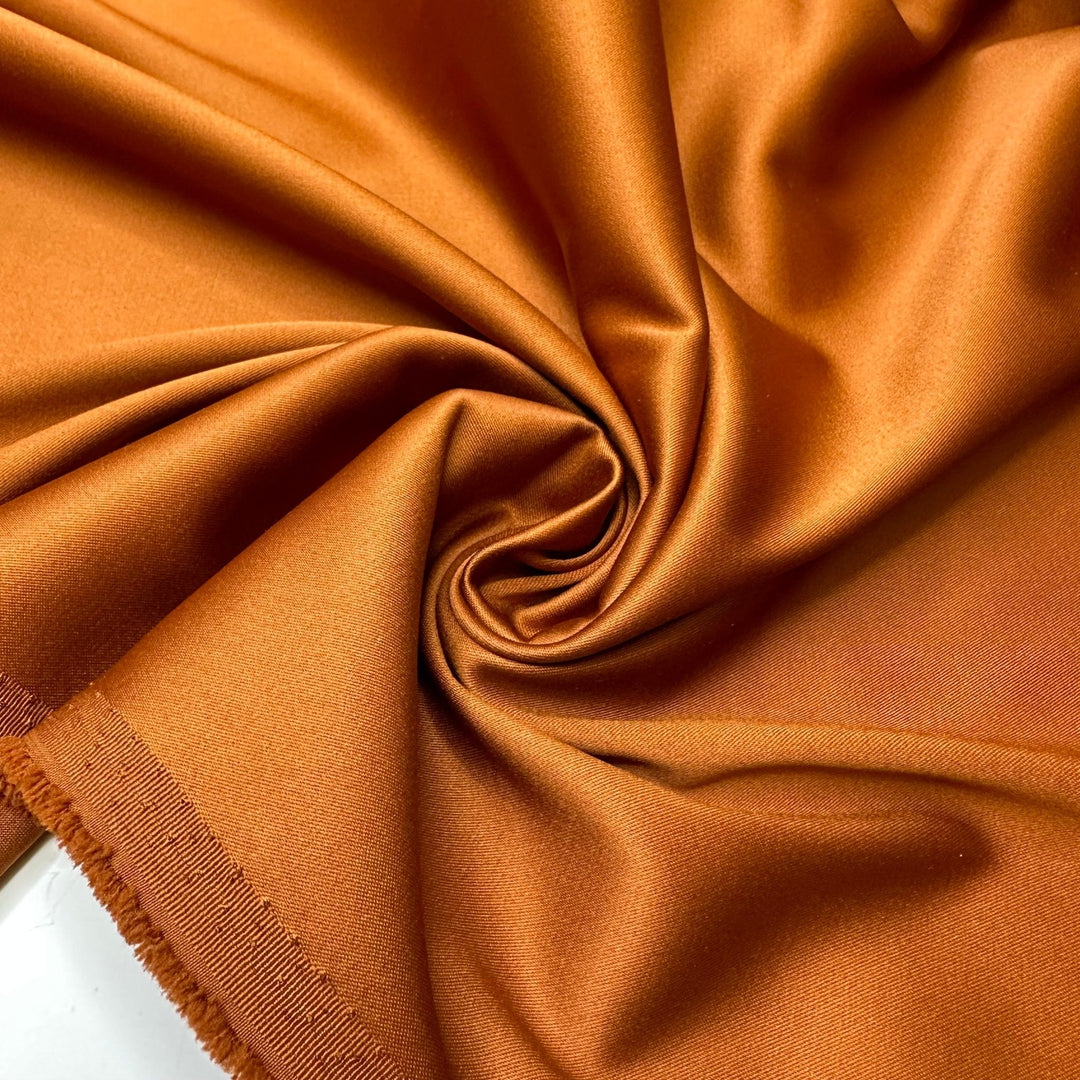 Brass Candle Sticks - Satin Poly/Spandex Woven - Copper - 1.25M Bundle - True Deadstock fabric Fabric by private - Sustainable Textile | FABCYCLE