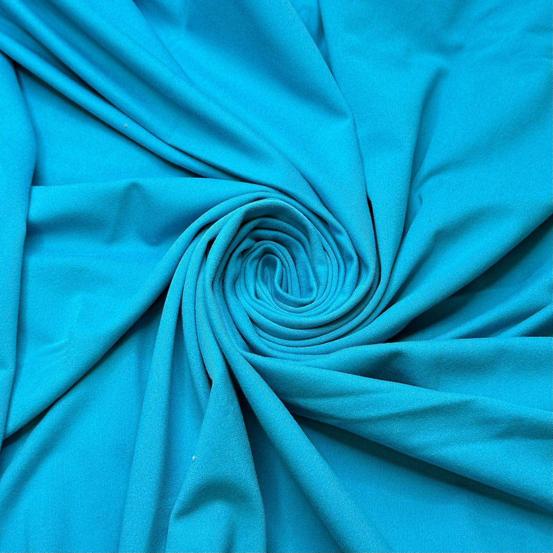 Caribbean Sailing - Brushed Jersey Polyester Blend Knit - Light Blue - 1M Bundle - True Deadstock fabric Fabric by private - Sustainable Textile | FABCYCLE