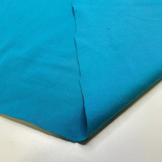 Caribbean Sailing - Brushed Jersey Polyester Blend Knit - Light Blue - 1M Bundle - True Deadstock fabric Fabric by private - Sustainable Textile | FABCYCLE