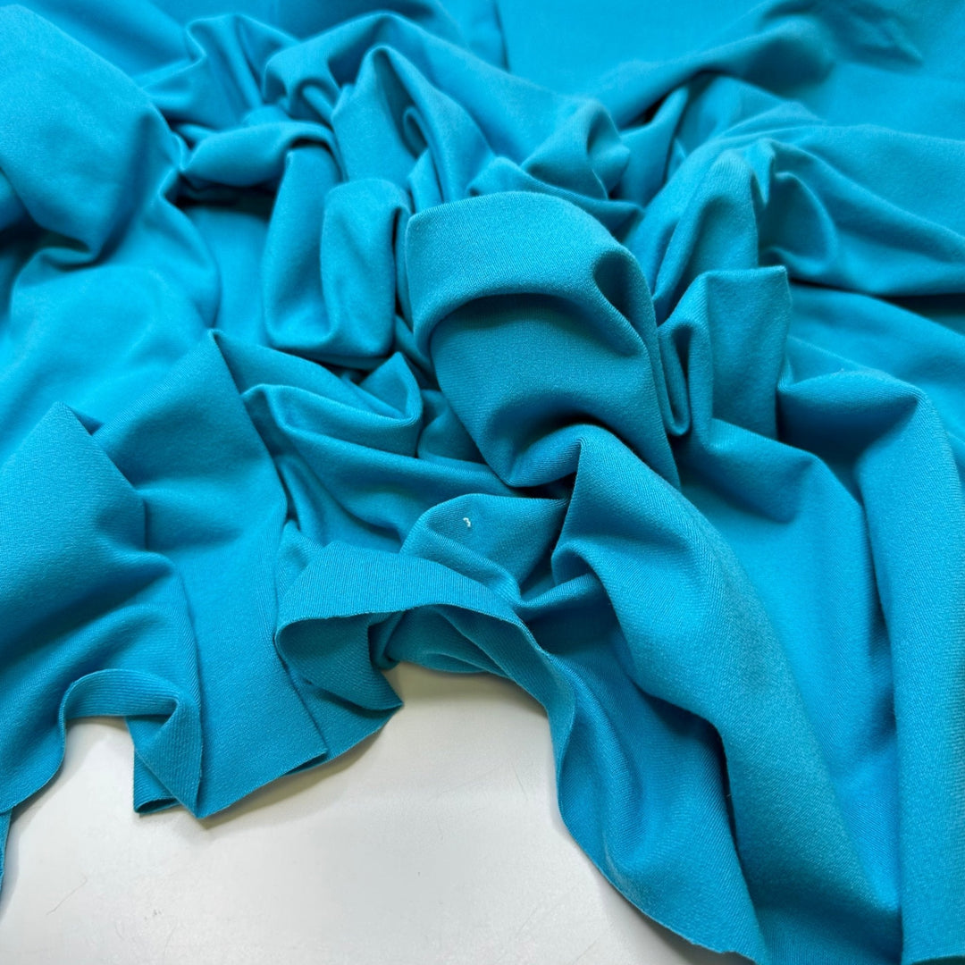 Caribbean Sailing - Brushed Jersey Polyester Blend Knit - Light Blue - 1M Bundle - True Deadstock fabric Fabric by private - Sustainable Textile | FABCYCLE