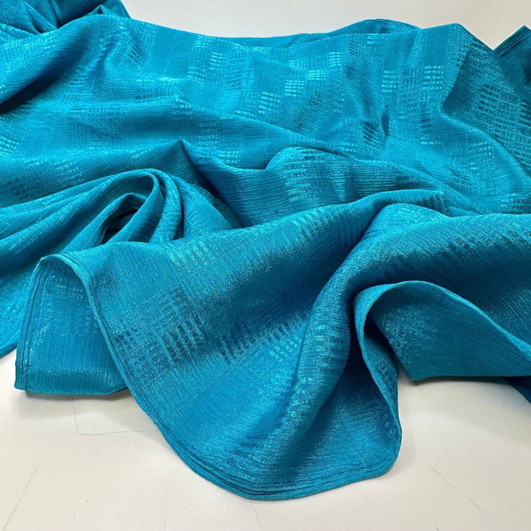 Celebrate The Good Times - Crinkle Sateen Poly Woven - Aqua Geometric - 2M Bundle - True Deadstock fabric Fabric by private - Sustainable Textile | FABCYCLE