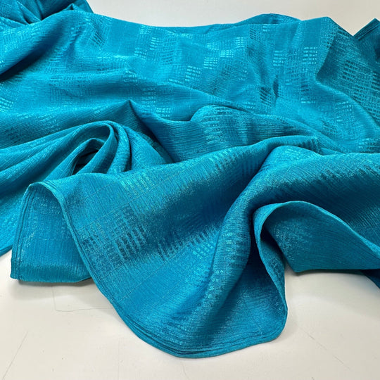 Celebrate The Good Times - Crinkle Sateen Poly Woven - Aqua Geometric - 2M Bundle - True Deadstock fabric Fabric by private - Sustainable Textile | FABCYCLE
