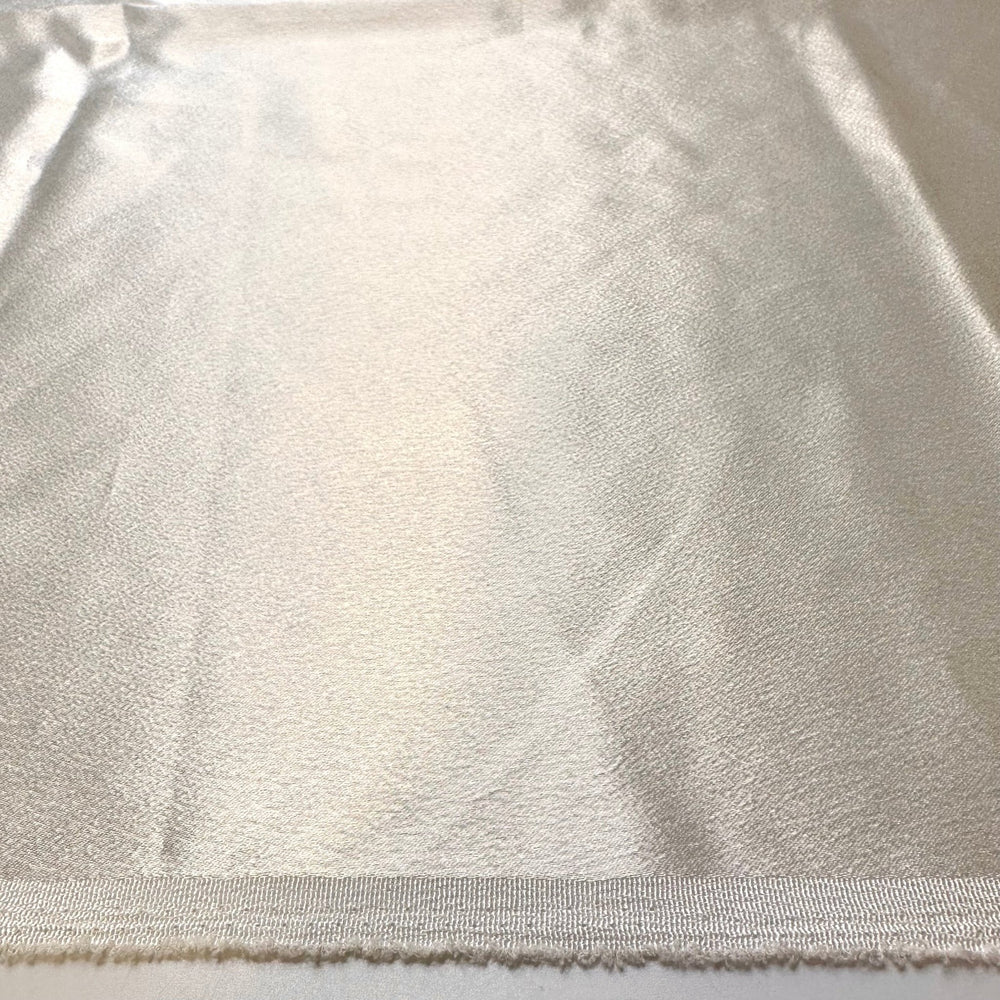 Celebrating Our Anniversary - Satin Poly Woven - Light Cream - 2M Bundle - True Deadstock fabric Fabric by private - Sustainable Textile | FABCYCLE