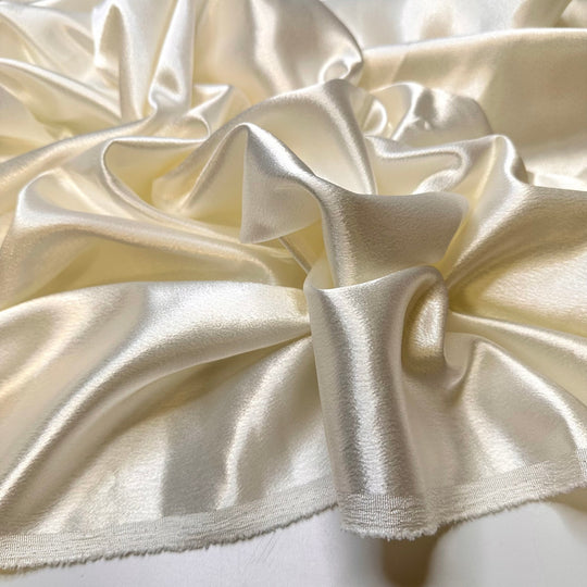 Celebrating Our Anniversary - Satin Poly Woven - Light Cream - 2M Bundle - True Deadstock fabric Fabric by private - Sustainable Textile | FABCYCLE