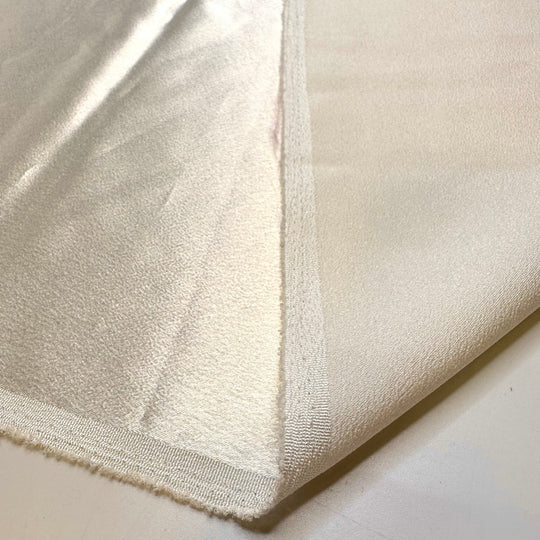 Celebrating Our Anniversary - Satin Poly Woven - Light Cream - 2M Bundle - True Deadstock fabric Fabric by private - Sustainable Textile | FABCYCLE