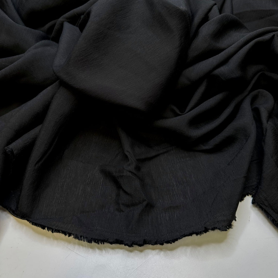 Cloaked In The Dark Of The New Moon - Poly/Tencel Woven - Black - Bundles - True Deadstock fabric Fabric by private - Sustainable Textile | FABCYCLE