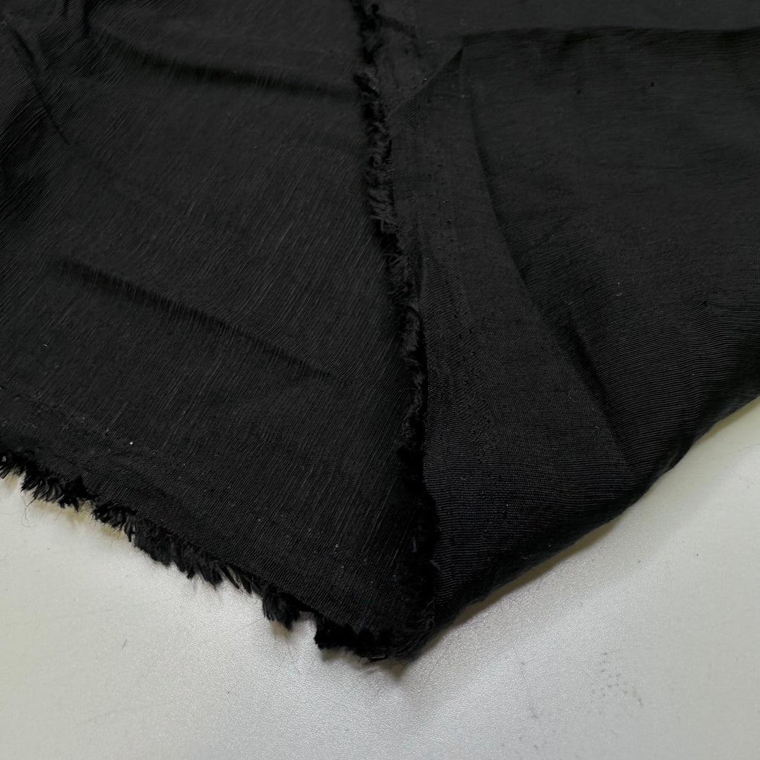 Cloaked In The Dark Of The New Moon - Poly/Tencel Woven - Black - Bundles - True Deadstock fabric Fabric by private - Sustainable Textile | FABCYCLE