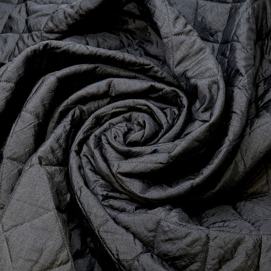 Comforting Abyss - Quilted Batting Poly Woven - Black/White - 2M Bundle - True Deadstock fabric Fabric by private - Sustainable Textile | FABCYCLE