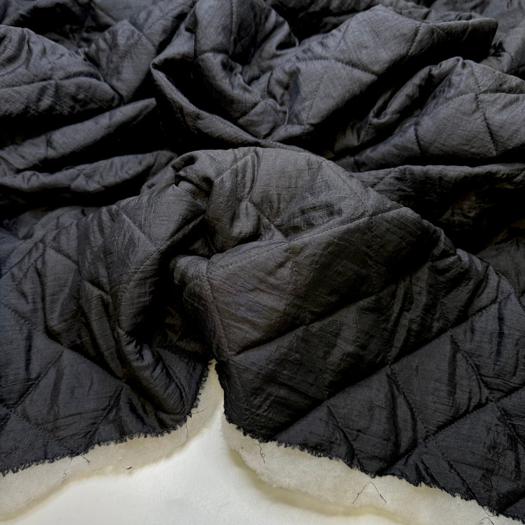 Comforting Abyss - Quilted Batting Poly Woven - Black/White - 2M Bundle - True Deadstock fabric Fabric by private - Sustainable Textile | FABCYCLE