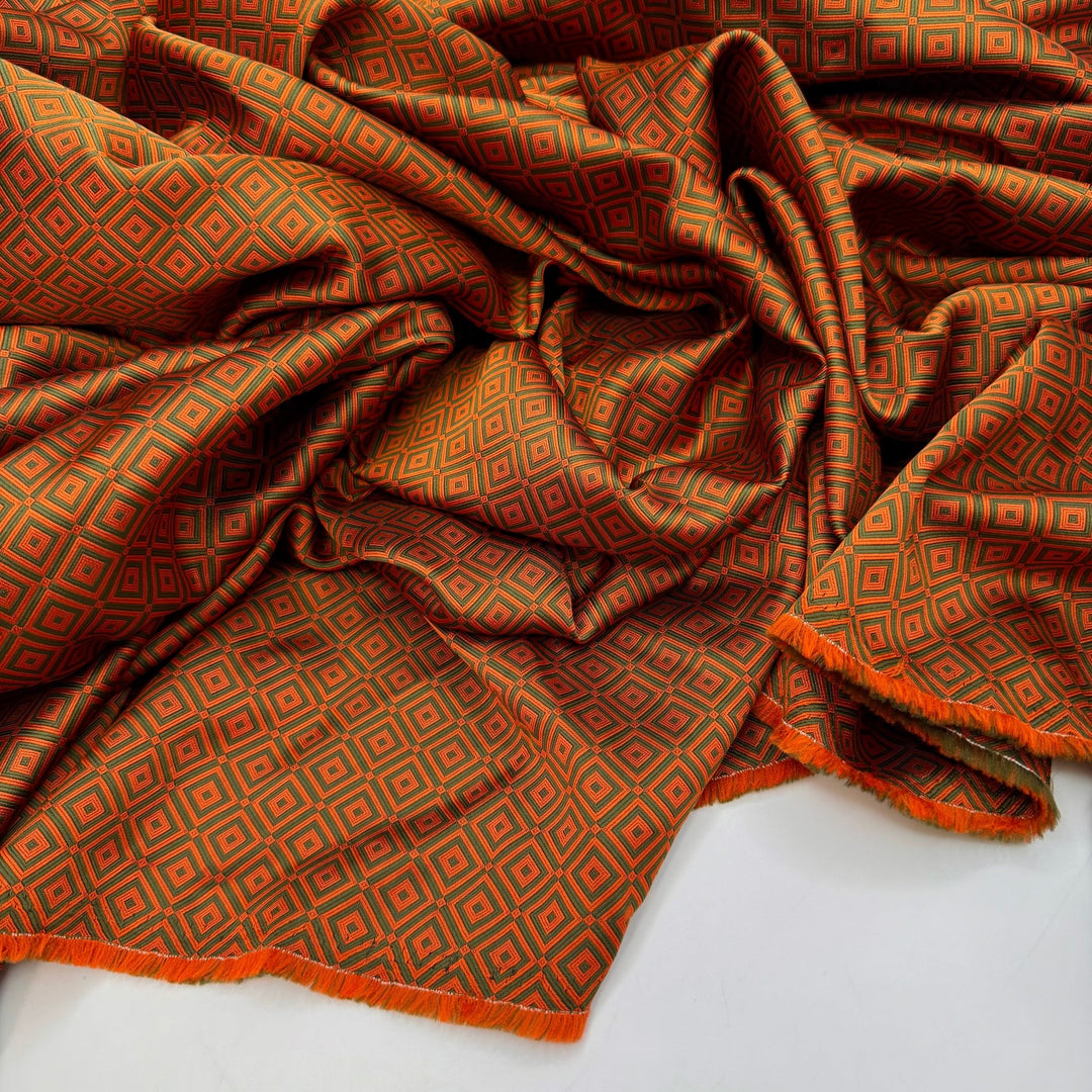 Conversation Starter - Polyester Blend Woven - Dark Orange/Green Geometric - 3.35M Bundle - True Deadstock fabric Fabric by private - Sustainable Textile | FABCYCLE