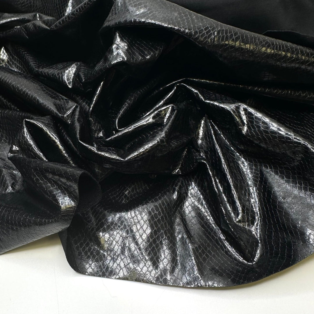 Cruella 2.0 - fake snakeskin Polyester Backing PU/Poly Woven - Black Animal Print - 0.7M Bundle - True Deadstock fabric Fabric by private - Sustainable Textile | FABCYCLE