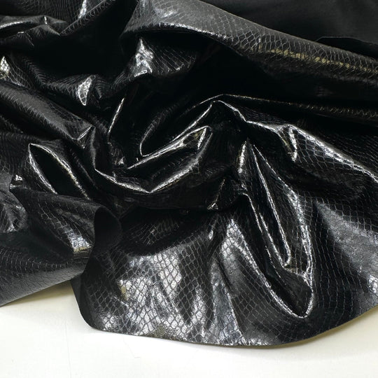 Cruella 2.0 - fake snakeskin Polyester Backing PU/Poly Woven - Black Animal Print - 0.7M Bundle - True Deadstock fabric Fabric by private - Sustainable Textile | FABCYCLE