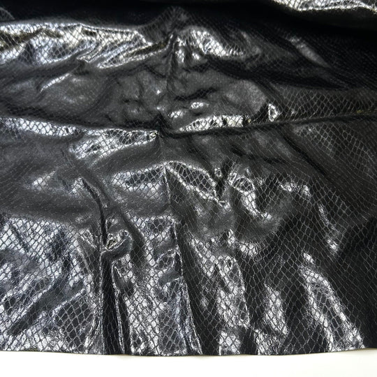 Cruella 2.0 - fake snakeskin Polyester Backing PU/Poly Woven - Black Animal Print - 0.7M Bundle - True Deadstock fabric Fabric by private - Sustainable Textile | FABCYCLE