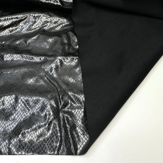Cruella 2.0 - fake snakeskin Polyester Backing PU/Poly Woven - Black Animal Print - 0.7M Bundle - True Deadstock fabric Fabric by private - Sustainable Textile | FABCYCLE