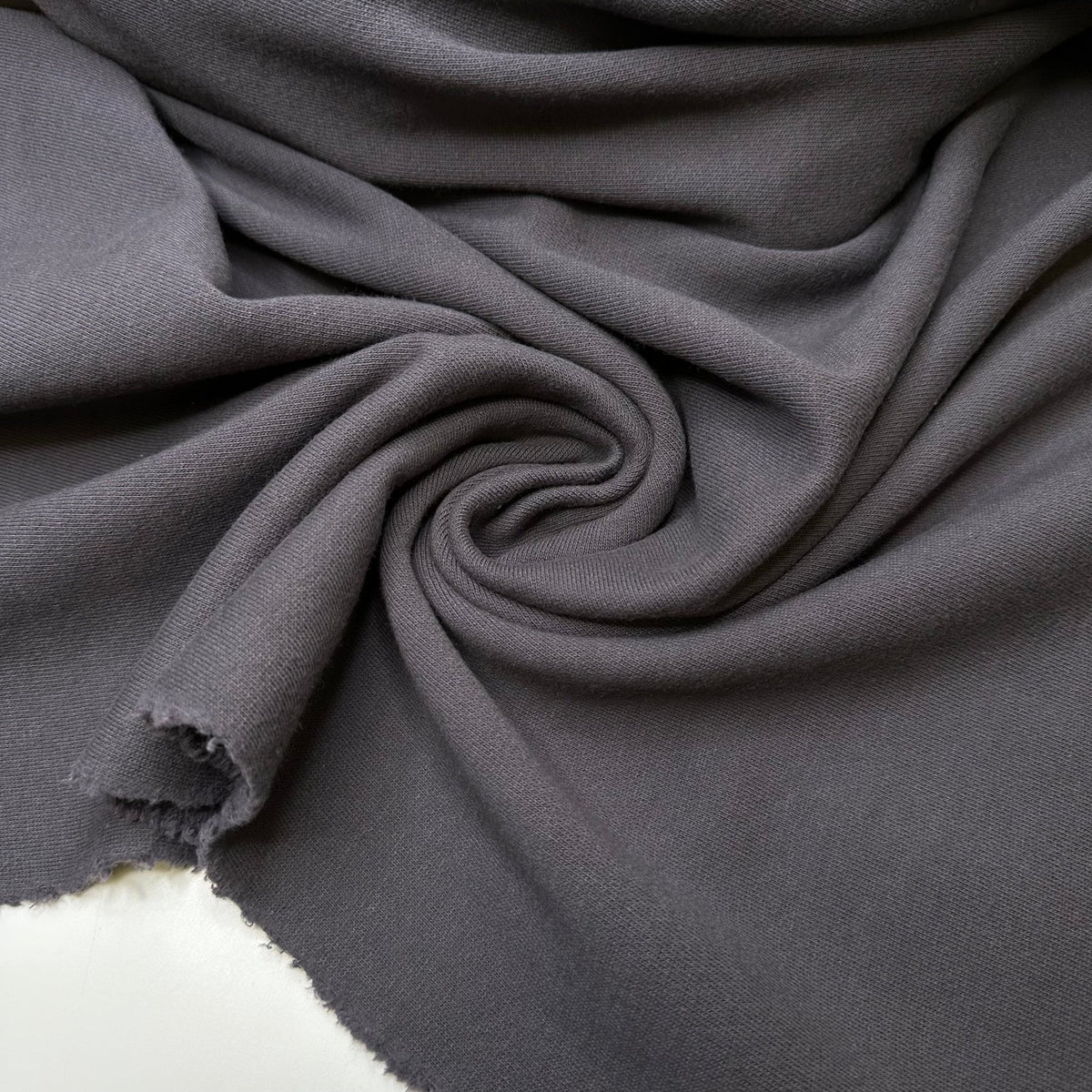 Cute As A Elephants Ear - Jersey Fleece Cotton Knit - Dark Grey - Bundles - True Deadstock fabric Fabric by private - Sustainable Textile | FABCYCLE