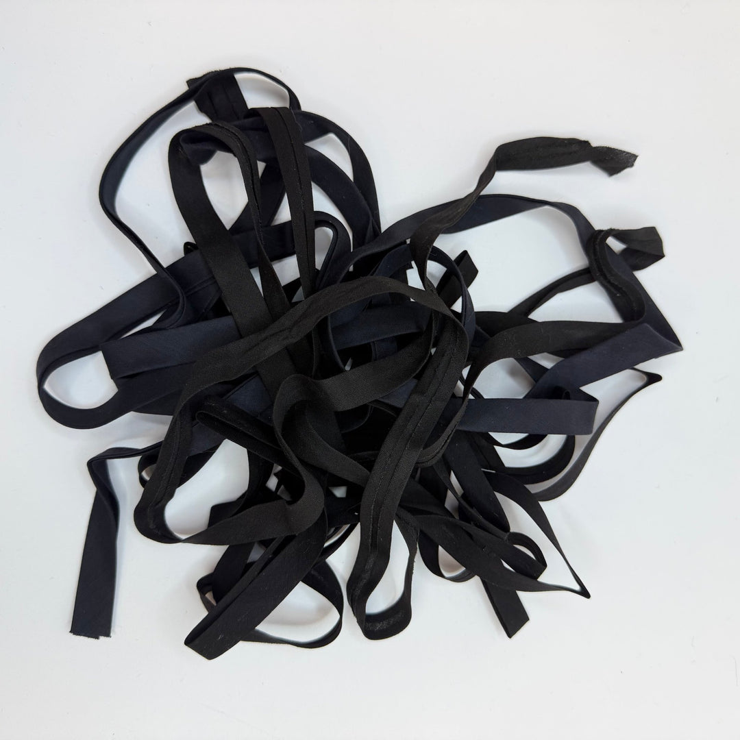 ¼" Double Fold Woven Bias Tape - Black - 1M Package - True Deadstock supplies Fabric by private - Sustainable Textile | FABCYCLE