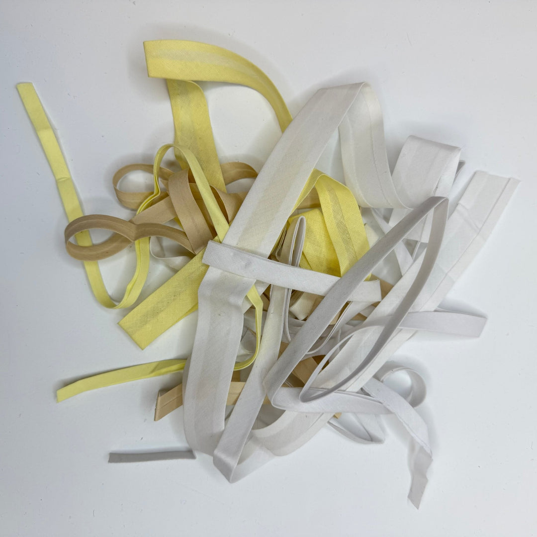 ¼" Double Fold Woven Bias Tape - Cream/Yellow - 1M Package - True Deadstock supplies Fabric by private - Sustainable Textile | FABCYCLE